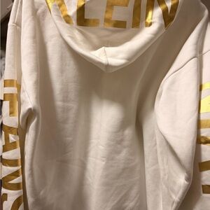 Calvin Klein Cream Hoodie with Gold Accents